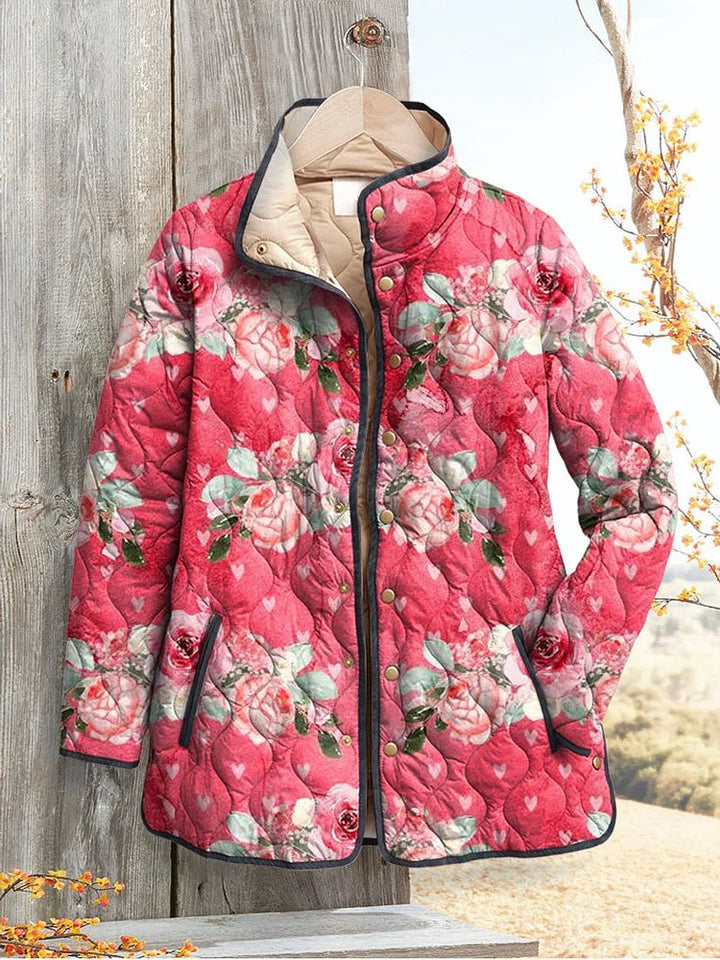 Reinhild Steppjacke mit rosa Blumen-Print Foto 1